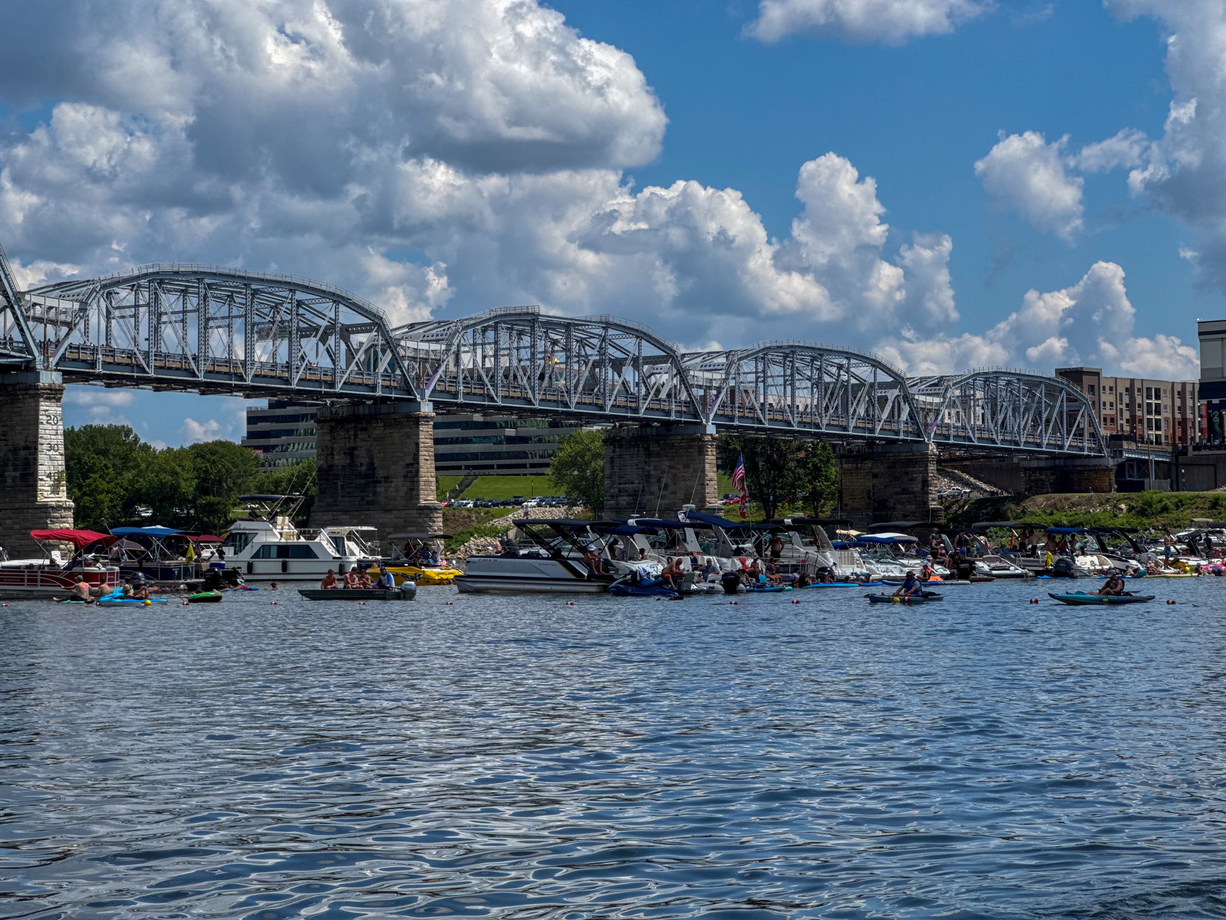Ohio River under a Cincinnati bridge, boats on the water
